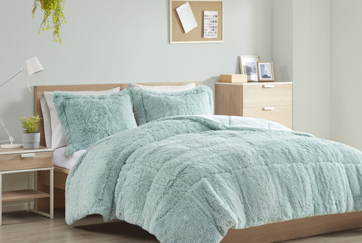 The Intelligent Design Malea Shaggy Long Fur Comforter Mini Set brings a soft contemporary update to your bedroom. The comforter and shams (1 in Twin/TwinXL) feature stylish shaggy faux fur that creates a soft fluffy texture and modern look. The solid plush reverse adds a soft and warm touch. Items in the set may come in a rolled or compressed packaging