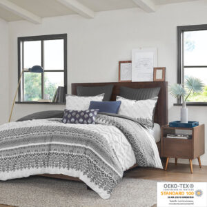 Transform your bedroom with the charming shabby chic allure of the INK+IVY Mila 3 Piece Cotton Duvet Cover Set with Chenille Tufting. The cotton duvet cover flaunts an updated gray botanic print