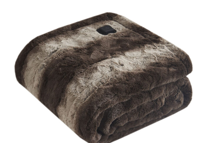 Relax in pure cozy comfort with the Beautyrest Zuri Heated Wrap with Built-in Controller. Made from ultra-soft fur with a plus reverse