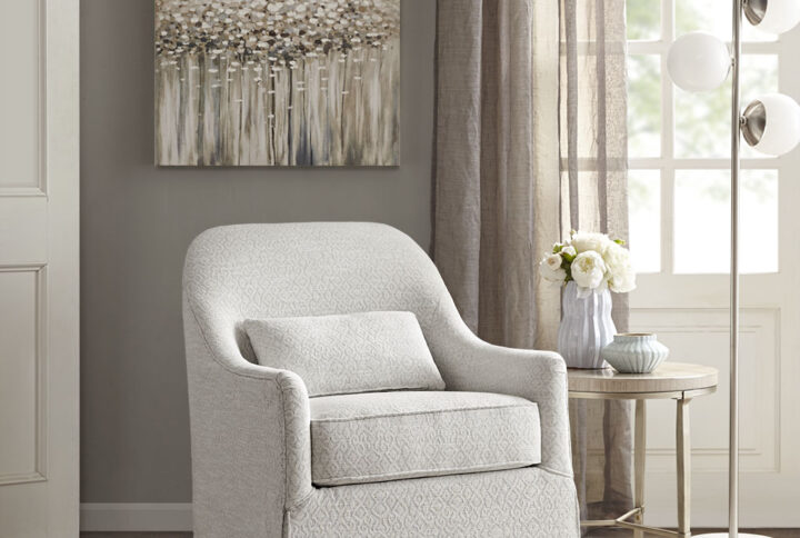 Sit back and relax in the comfort of the Madison Park Theo Swivel Glider Chair. The soft