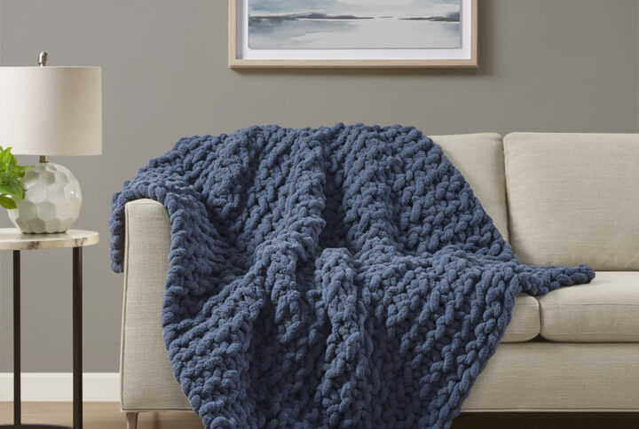 Indulge in pure comfort by wrapping yourself in the Madison Park Chenille Chunky Knit Throw. This chunky knit throw is handmade from luxurious chenille yarn to create a soft and cozy feel that's perfect to snuggle up in. The chunky knit throw is also OEKO-TEX certified