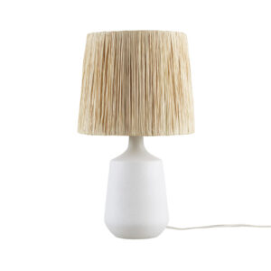 this lamp features a ceramic base finished in textured matte-white