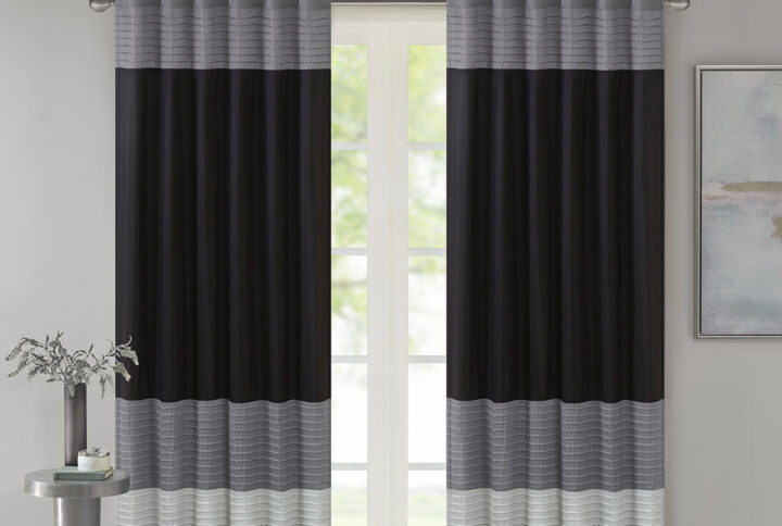 Madison Park Amherst Polyoni Pintuck Window Curtain is a simple way to add style to your room. This window panel features a modern striped design in dark hues of black