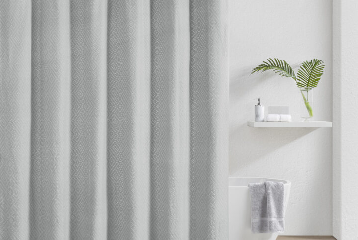 A beautiful shower curtain with fine woven details that will make any bath feel like a spa. Its bumpy texture is created by a matelassé woven technique that originated from Matelassé