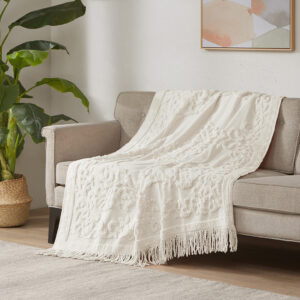 The Madison Park Chloe Cotton Tufted Throw provides a luxurious addition to your home decor. This ivory throw flaunts an elegant tufted chenille design with a 4-inch fringe on each end