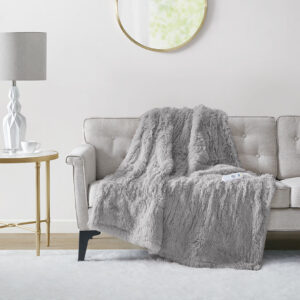 The Serta Malea Shaggy Faux Fur Heated Throw offers a rich textural touch to keep you warm and cozy. This heated throw flaunts an ultra-soft shaggy fur face that flips to a plush reverse to create an incredible soft look and feel. A single controller has 5 heat settings to easily find your preferred comfort level and the 3 hour auto shut off timer ensures your safety. Machine washable for easy care