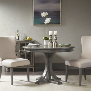 Gather round the Madison Park Signature Helena Round Dining Table. Featuring a grey wood finish with distressed edge detail