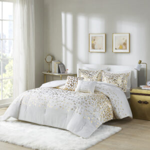 Add a fierce and flashy look to your bedroom with the Intelligent Design Lillie Metallic Animal Printed Comforter Set. The ultra-soft microfiber comforter flaunts a stunning gold metallic animal leopard print on an ivory base