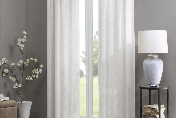 Madison Park’s Irina Diamond Sheer Window Curtain provides an alluring update to your home. An elegant diamond pattern is beautifully embroidered on a soft sheer fabric