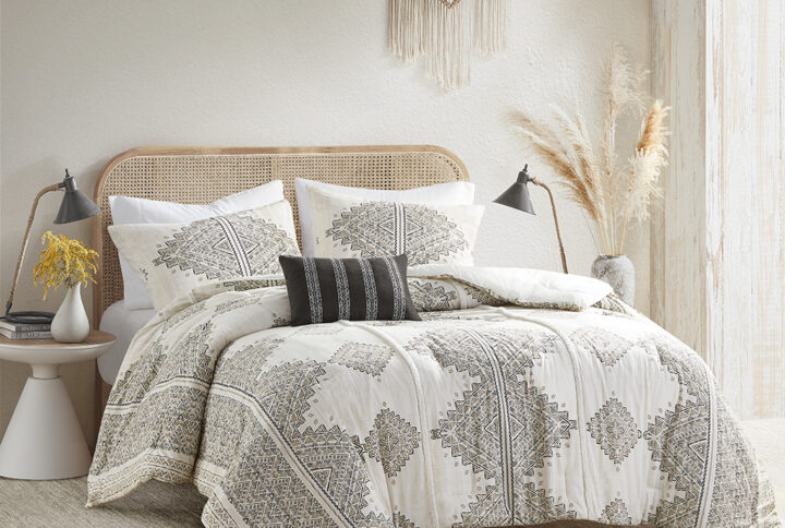 This soft microfiber artisan comforter set displays a printed global inspired design