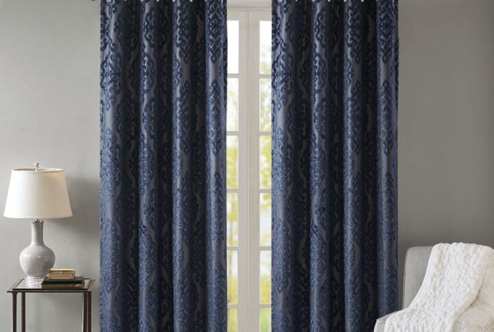 Give your home the lavish style and energy efficiency it deserves with the SunSmart Mirage Knitted Jacquard Total Blackout Panel. This elegant window panel flaunts a knitted jacquard damask design in a rich grey ground with navy burnout pattern