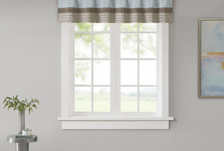 Madison Park Amherst Polyoni Pintuck Window Valance is a simple way to add style to your room. This window valance features a modern striped design in subtle hues of blue