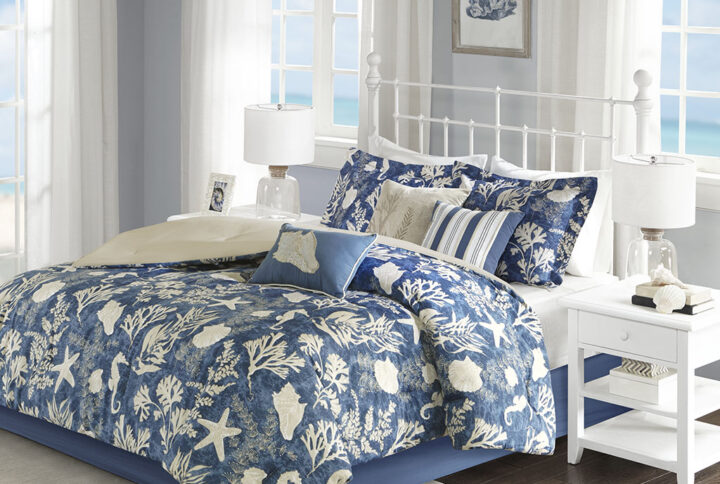 Refresh your bedroom with the coastal style of the Madison Park Cape Cod 7 Piece Cotton Sateen Comforter Set. A charming coastal motif and an elegant sheen adorn the blue comforter