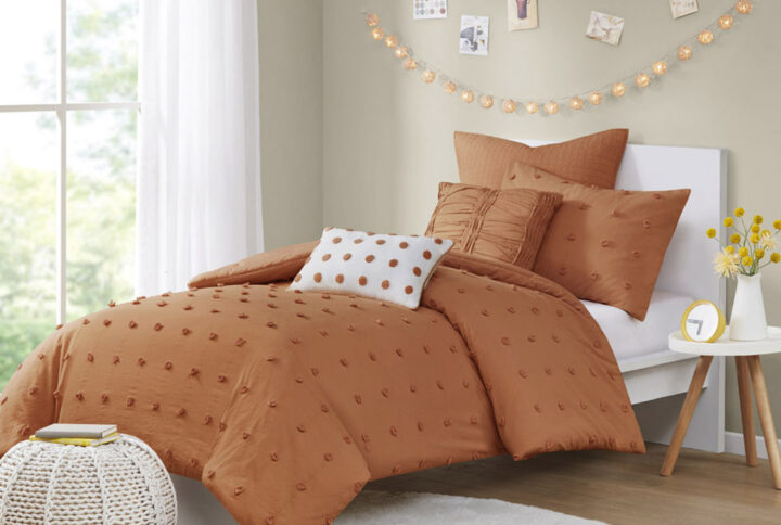 The Urban Habitat Brooklyn Cotton Jacquard Duvet Cover Set features small tufted chenille dots that create a fresh shabby chic look. This duvet cover set brings a soft and charming update to your bedroom