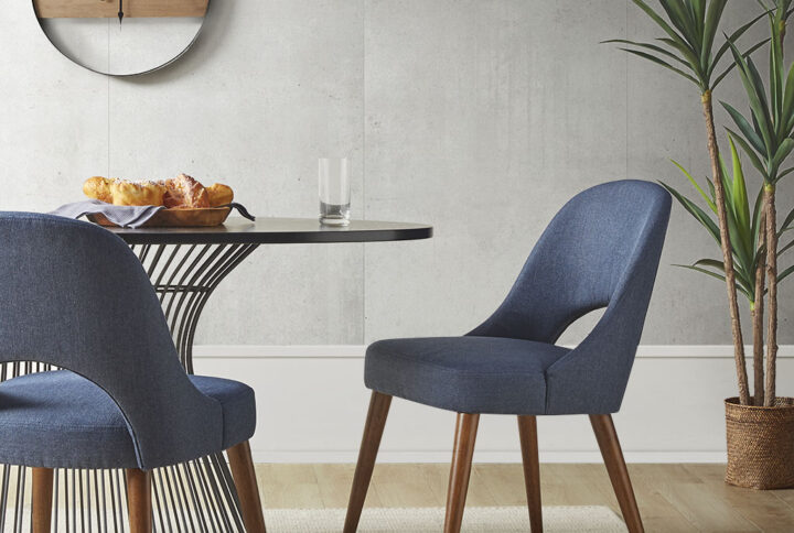 Dress up your dining room with the INK+IVY Nola Dining Chair Set. Upholstered in a textured fabric