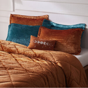 rust comforter features a quilted diamond top that adds dimension to the glamorous look. Matching shams (1 for Twin/Twin XL Sizes) coordinate with the velvet comforter