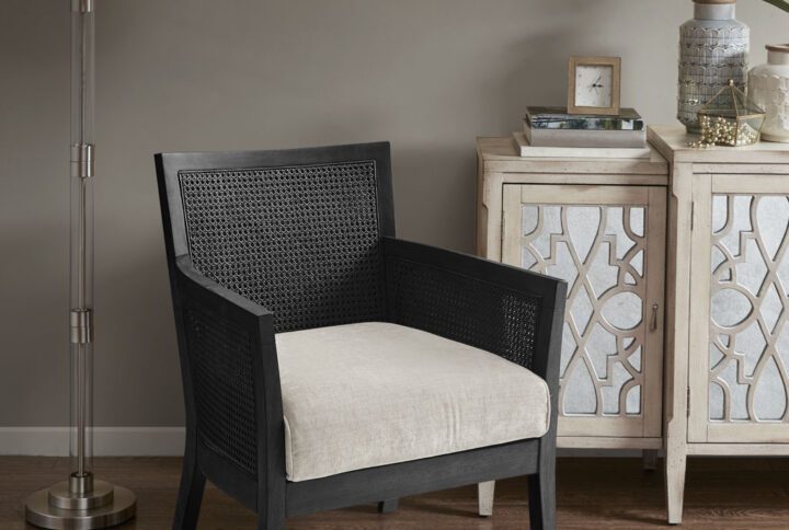 Relax in the comfort and simple style of the Madison Park Diedra Cane Armchair. The unique cane back and sides display a charming farmhouse look.  A loose seat uses high-density foam filling for long-lasting comfort and exceptional support. Place this accent chair in your living room or home office for a chic update to your decor.  Assembly required