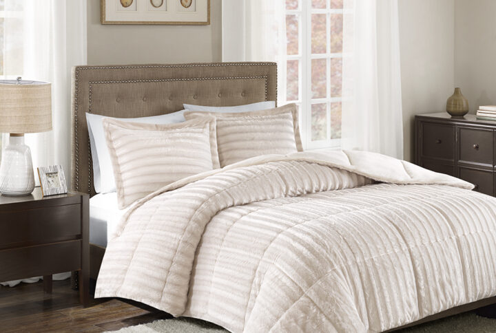 Add glamor and style to your home with the Madison Park Duke faux fur comforter set. Made from a super soft faux fur