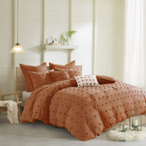 The Urban Habitat Brooklyn Cotton Jacquard Duvet Cover Set features small tufted chenille dots that create a fresh shabby chic look. This duvet cover set brings a soft and charming update to your bedroom