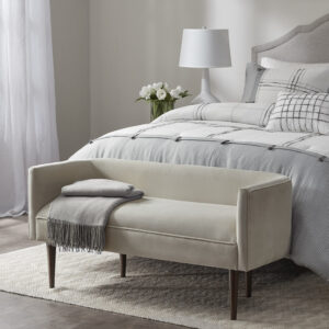 The Madison Park Farrah Accent Bench offers a fashionably unique update to your living room or entryway. This accent bench is upholstered in a rich cream velvet fabric and features a low back and sides