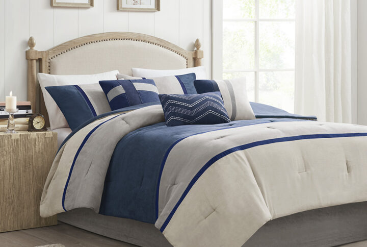 The Madison Park 7 Piece Palisades Comforter Set offers you a casual alternative in fashion bedding. The reverse of the comforter is solid blue. The soft microsuede in heather grey