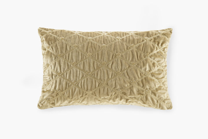 This sumptuous oblong pillow features foxtail stitched