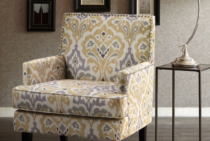 The Madison Park Colton Track Arm Club Chair brings a simple and sharp update to your home decor. This accent club chair features a sleek design with track arms and a nailhead trim along the back and sides