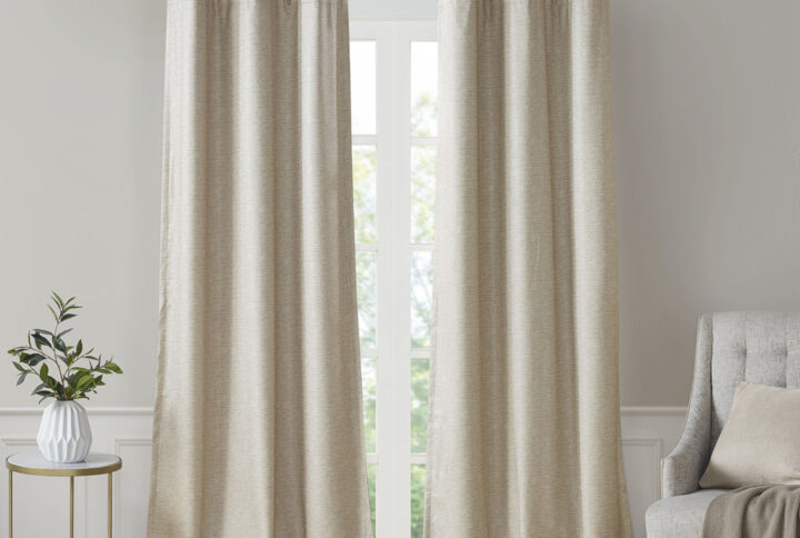 Elevate your decor with the modern style and function of our SunSmart Como Tonal Printed Faux Silk Room Darkening Panel Pair. This curtain pair flaunts a tonal hue on a faux silk textured fabric that creates a beautiful and rich modern look. Registered with OEKO-TEX certification