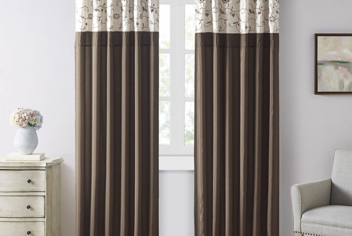 Add simple elegance to any room with the Madison Park Serene Embroidered Window Panel. This window curtain features delicate floral embroidery in rich red and natural hues