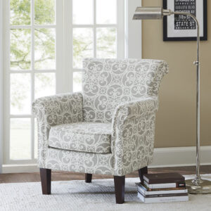 Add an eye-catching touch to your living room with the Madison Park Brooke Tight Back Club Chair. This accent chair features an all-over fretwork pattern on the upholstery that creates a stunning transitional look. The double row nailhead trim on the front of the arms and the sides of the back add an elegant accent to the design. With a comfortable loose cushion and sturdy solid wood legs