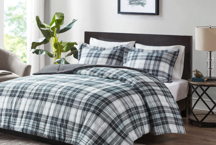 Sleep comfortably with the Madison Park Essentials Parkston 3M Scotchgard Down Alternative Comforter Mini Set. Sporting a cool plaid pattern