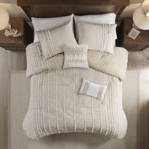 this cotton yarn dyed comforter showcases stripes of various widths in soft taupe and white hues. Clip Jacquard detailing add alluring texture and dimension and flaunt a chic