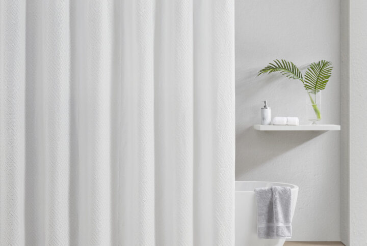 A beautiful shower curtain with fine woven details that will make any bath feel like a spa. Its bumpy texture is created by a matelassé woven technique that originated from Matelassé