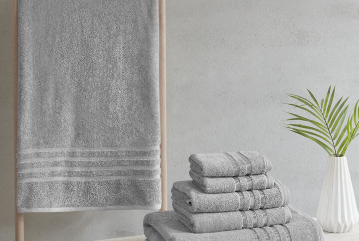 Complete your bathroom decor with our Clean Spaces Nurture Sustainable Antimicrobial 6PC Towel Set. This eco-friendly solid grey towel set is made from regenerated cotton and recycled polyester fibers safeguarding our resources for a better carbon footprint