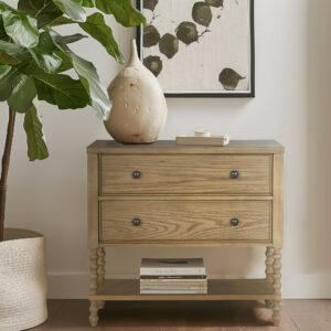 Elevate your living room with the sophisticated style of the Madison Park Signature Beckett Accent Chest. This 2-drawer accent chest features a solid wood frame and elegant turned legs