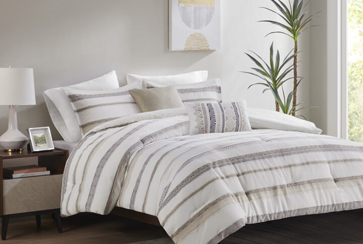 Brighten your bedroom with the refreshing beauty of this globally inspired comforter set. A clipped jacquard stripe design