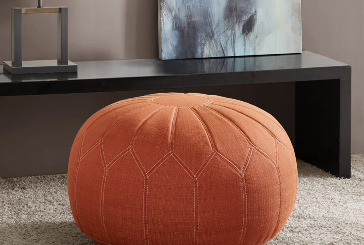 This oversized ottoman pouf will make a statement in any home. Filled with polystyrene beads