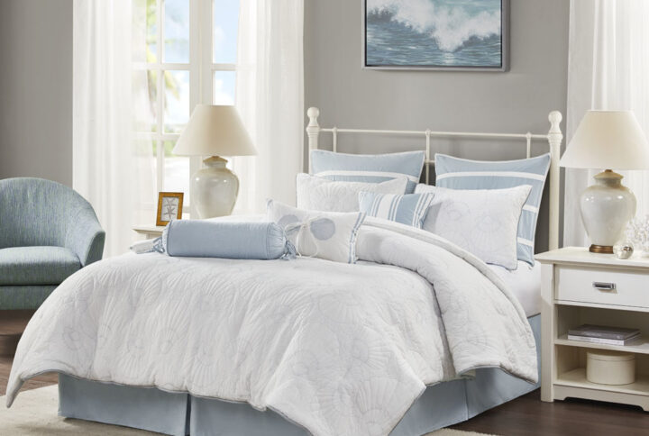 Create a costal retreat in your bedroom with the Harbor House Crystal Beach Comforter Set. The white cotton comforter and shams feature all-over blue quilting