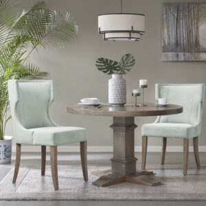 Define your dining room with the elegance of the Madison Park Carson dining chair. This upholstered dining chair features a wingback style back with piping details around the frame that create clean lines and curves