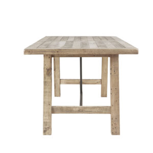 this rectangular dining table comfortably seats up to six people and features a weathered finish to give it a more natural appeal. Color variations are natural to pine wood and add to the character of the piece. Metal stretchers in a gunmetal hue provide support