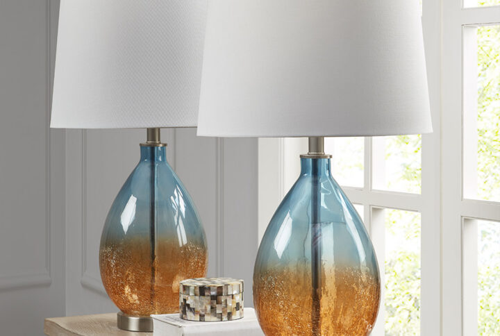 Update your space with the sleek style of the Cortina Ombre Glass Table Lamp