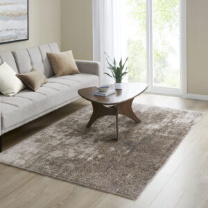 Elevate the style of your living space with the Madison Park Haley Cozy Shag Abstract Area Rug. This soft plush area rug showcases a grey and cream abstract design to create a gorgeous modern look. The super soft