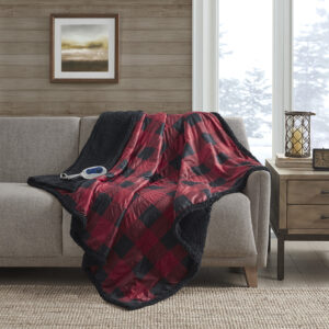 Stay warm and indulge in pure comfort with the Woolrich Linden Heated Throw. This red heated throw features a soft mink face with a solid and cozy berber reverse that creates a luxurious look with an incredibly soft feel. The attached controller provides 3 different temperature settings to provide the perfect level of warmth that keeps you the most comfortable when bundled up. The controller also has a 2 hour auto shut off timer to ensure your safety during prolonged use. Machine washable for easy care