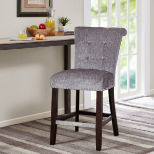 Elegant silver nail heads add an extra touch of dignified style to this roll back button tufted counter stool. Assembly required.