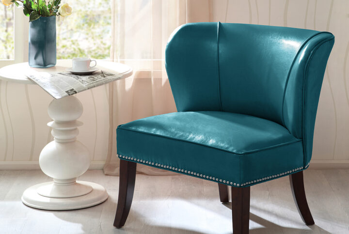 The Madison Park Hilton Armless Accent Chair introduces a bold