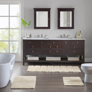 Transform your bathroom into a simple and stylish haven with our Madison Park Tufted Pearl Channel Rug. This solid tufted bath rug features a high-low stripe design with a light sheen and luster that adds rich dimension and texture for the perfect shabby chic touch your bathroom decor. Constructed from 100% macro-spun polyester fibers