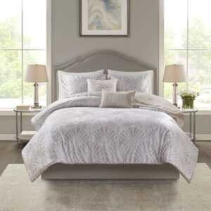 Give your bedroom a luxurious update with the Beautyrest Kiona 5 Piece Crushed Velvet Comforter Set. The oversized champagne crushed velvet comforter set features an art deco pattern for an elegant bedroom style. Embroidered abstract patterns in the square pillow and oblong pillow add the finishing touches to complete the look. Machine washable for easy care