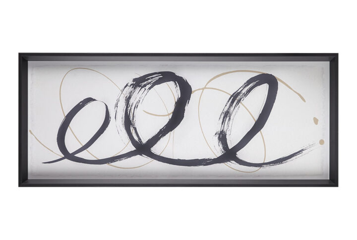 The Madison Park Abstract Ambit Framed Glass Wall Art offers a modern elegance to your home and decor. Bold black and matte gold tone brushstrokes are printed on a light neutral ground and feature deckled edges