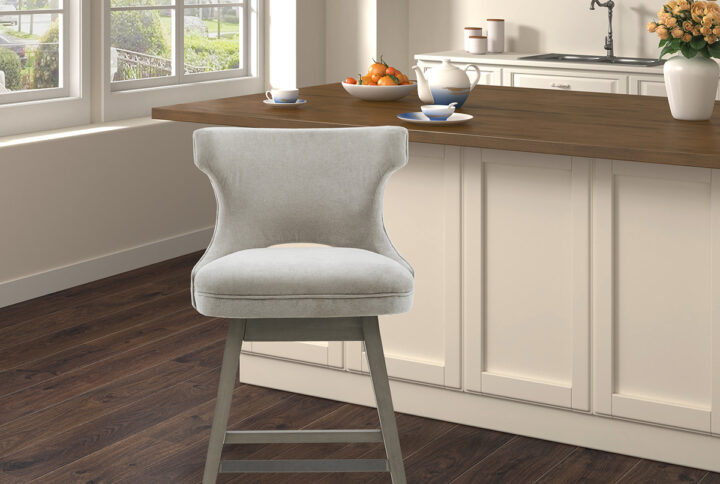 The Madison Park Emmett Swivel Counter Stool Adds A Charming Transitional Update To Your Dining Decor. This Swivel Counter Stool Is Upholstered In A Light Grey Soft Fabric With A Light Grey Wood Finish