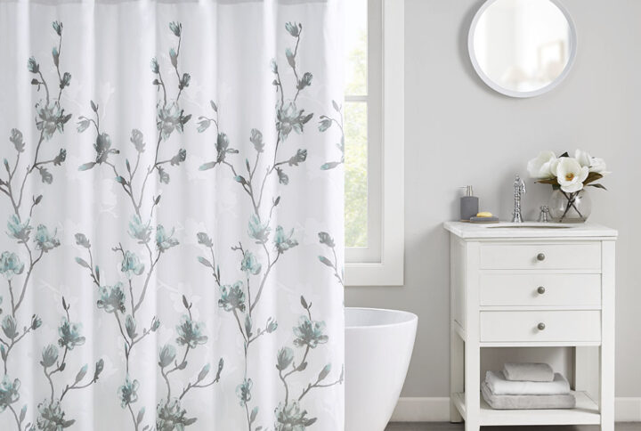 Add a soft touch of beauty to your bathroom with our Madison Park Magnolia Floral Printed Burnout Shower Curtain. This light weight shower curtain features a beautiful floral printed burnout design in soft aqua and grey hues